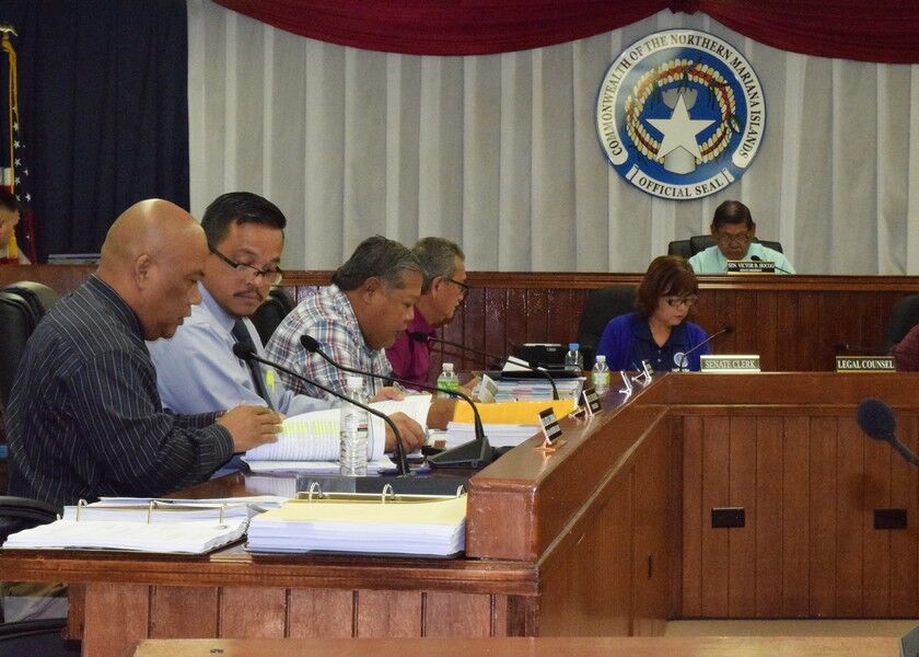 From left, Sen. Sixto Igisomar, Senate Vice President Jude Hofschneider, Sen. Frank Borja, and Senate Floor Leader Justo Quitugua attend the Senate session on Monday. Also in photo are Senate President Victor Hocog, Senate clerk Doris Bermudes, and legal counsel Joe Bermudes. Photo by Emmanuel T. Erediano
