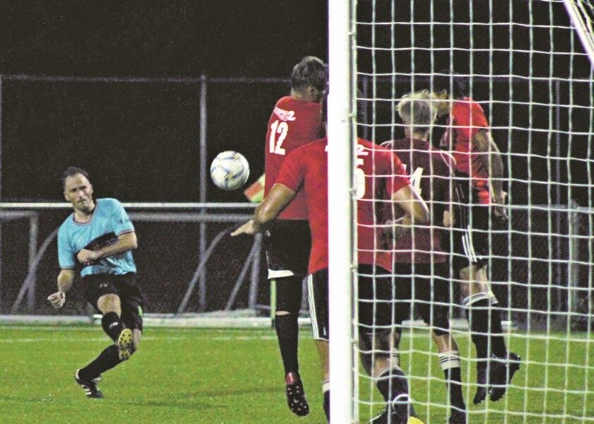 Eats Easy’s Martin Jambor takes the shot during Sunday’s championship game of the Men’s M-League Masters Division at the NMI Soccer Training Center. Photo by James F. Sablan Jr.
