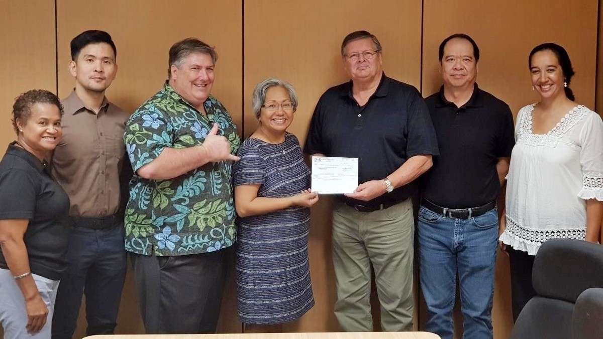 D&Q International resident manager Max Kretzers, third from right, present a $1,000 check on Jan. 15, 2020, for the Marianas Tourism Education Council Tourism Summit on Jan. 23, 2020. From left, D&Q sales manager Marilyn Marron, MTEC treasurer Robert Ryan Yulo, MTEC board member Glenn Policare, MTEC chairwoman Vicky Benavente, Kretzers, MTEC secretary Martin Duenas, and MTEC board member Catherine Perry.