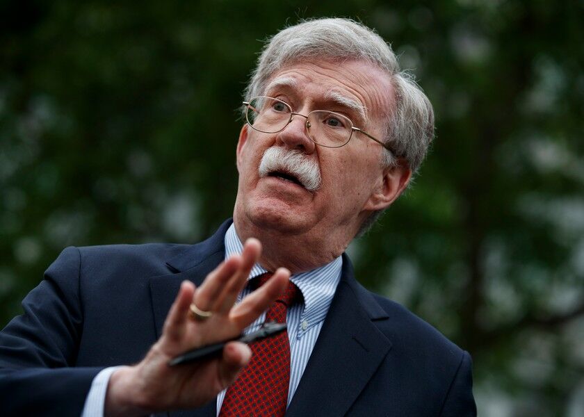 Then-National Security Adviser John Bolton talks to reporters outside the White House in Washington, D.C. on May 1, 2019. AP