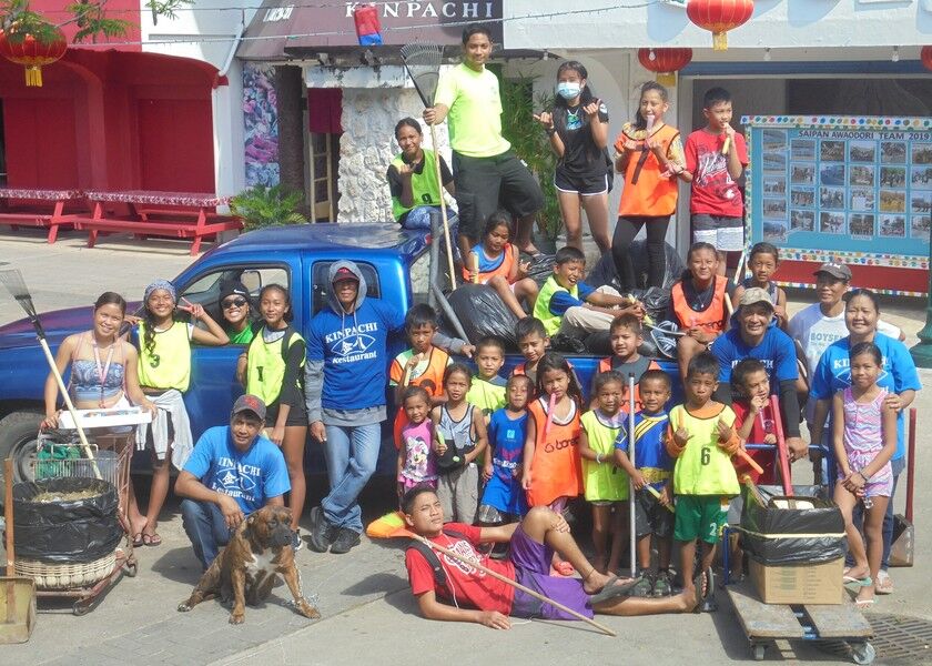 PDM Promoters volunteers pose for a photo after a cleanup drive at Paseo de Marianas. Contributed photos