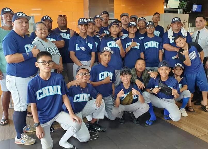 Members and coaches of the CNMI U15 national team pose for a photo at McDonald’s Tamuning on Guam where they were treated to breakfast by the management on Wednesday. Contributed photo