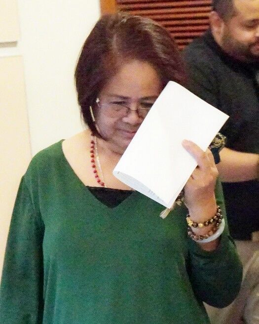 Yolanda Digoman, a Guam government nutrition assistant, leaves the courtroom after a change-of-plea hearing, Wednesday, in Hagåtña. Photo by David Castro/The Guam Daily Post