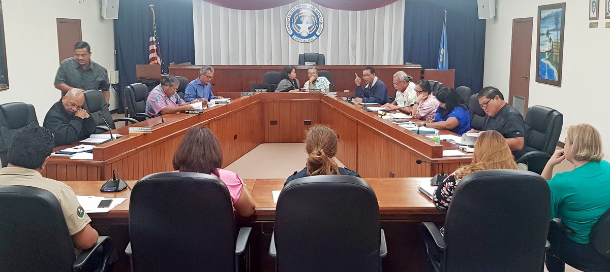 Members of the Senate Committee on Resources, Economic Development & Programs meet with Attorney General Edward Manibusan and officials of the Department of Public Lands, the Department of Lands and Natural Resources, and the Marianas Visitors Authority in the Senate chamber on Wednesday. 