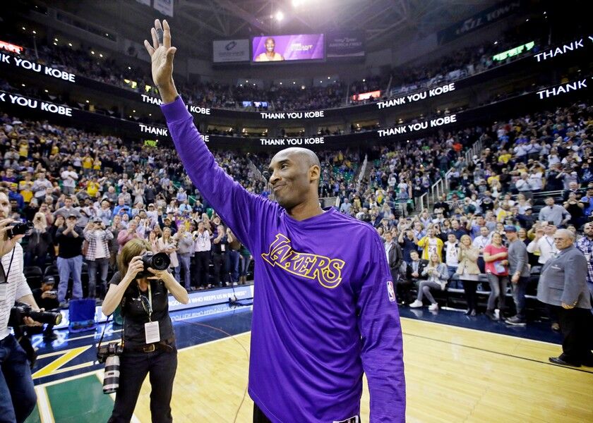 In this March 28, 2016, file photo, Los Angeles Lakers forward Kobe Bryant waves to the fans after his introduction before the start of the first quarter of an NBA basketball game against the Utah Jazz, in Salt Lake City. Bryant, the 18-time NBA All-Star who won five championships and became one of the greatest basketball players of his generation during a 20-year career with the Los Angeles Lakers, died in a helicopter crash Sunday, Jan. 26, 2020. He was 41. AP
