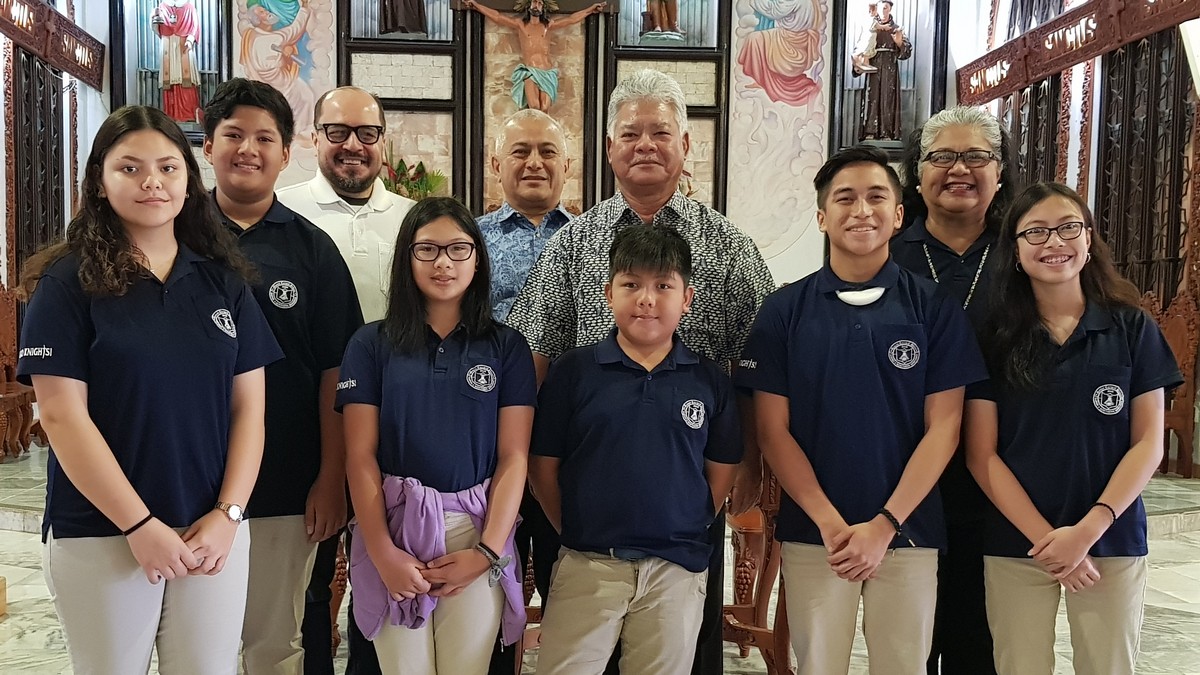 Mount Carmel School students pose with MCS president Dr. Galvin Deleon Guerrero, MCS board chairman Ben Babauta, Lt. Gov. Arnold I. Palacios, and MCS vice principal Barbara Merfalen. Photos by Lori Lyn C. Lirio