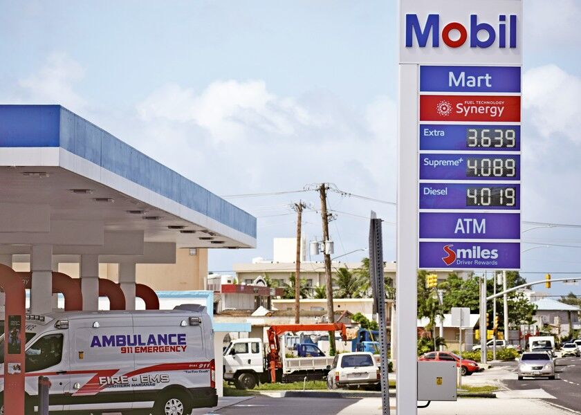 The new fuel prices are displayed at the Mobil Oil Marianas service station on Middle Road in Garapan on Tuesday. Photo by Emmanuel T. Erediano