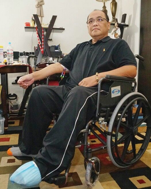 Alfredo Antolin sits in a wheelchair as he recovers from foot surgery on Thursday, Jan. 9. Photo by David Castro/The Guam Daily Post