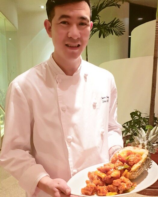 Grand Hyatt Shenyang China Guest Chef Jason Zhuang presents the Braised Pineapple Chicken.