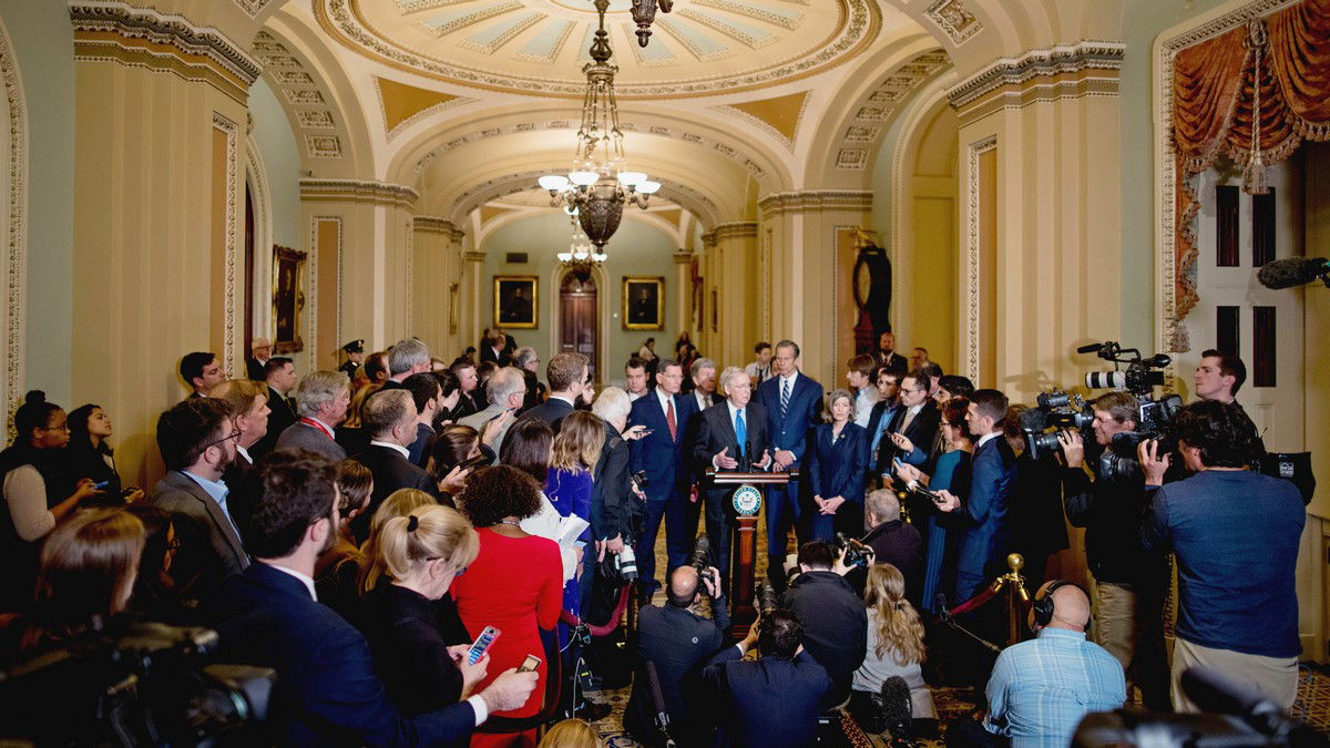 President Donald Trump speaks to the media near Vice President Mike Pence, front right, and Surgeon General Jerome Adams, back right, during the daily coronavirus-related briefing at the White House in Washington, D.C. on March 9, 2020. REUTERS