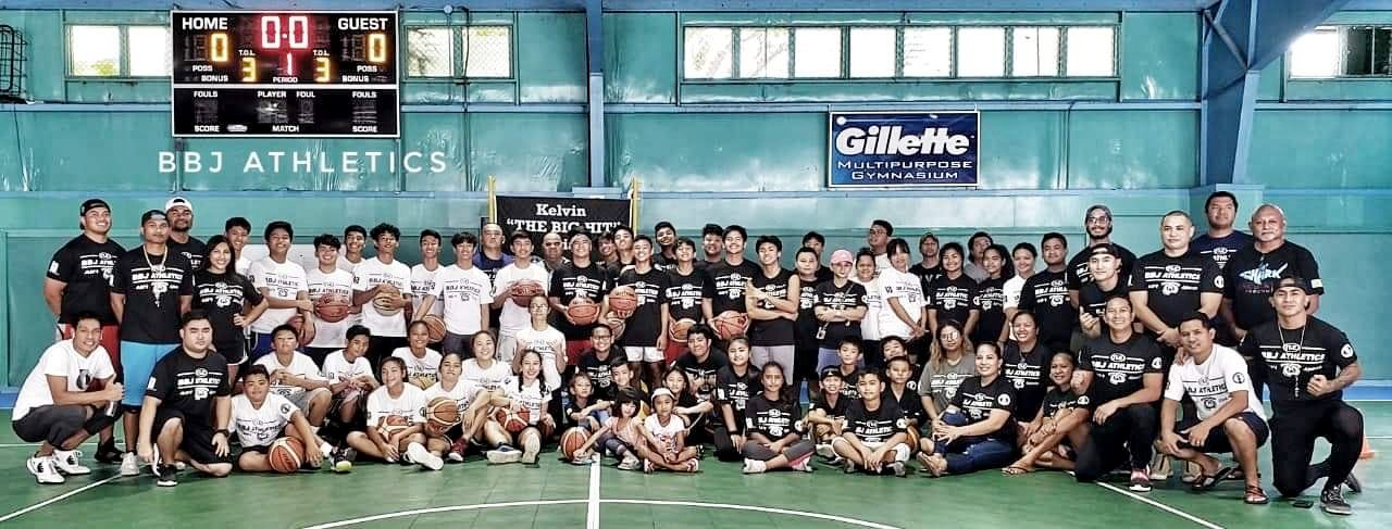 The BBJ Athletics team members pose with youth athletes who completed a two-day basketball skills and character-building clinic at the TSL Sports Complex. Contributed photos