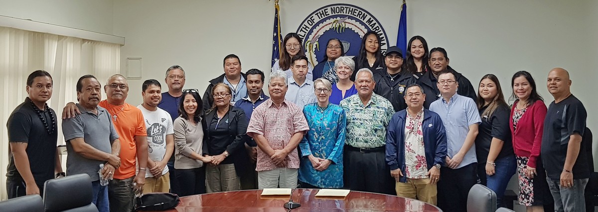 Lt. Gov. Arnold I. Palacios and Attorney General Edward Manibusan pose for a photo with other officials and advocates following the signing of the proclamation designating January as Human Trafficking Awareness and Prevention Month at the administration building on Jan. 10, 2020. Photo by Bryan Manabat