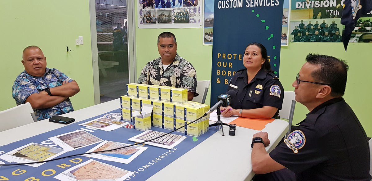 From left, Customs Division Director Jose Mafnas, Finance Secretary David Atalig, Customs planner and public information officer Reina Camacho, and compliance officer James Santos conduct a press briefing regarding intercepted goods on Tuesday. Photo by Junhan B. Todiño