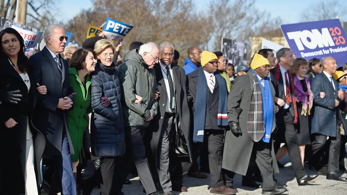 Most of the Democrats seeking their party’s presidential nomination march in a Martin Luther King Jr. Day rally on Monday in Columbia, S.C. AP
