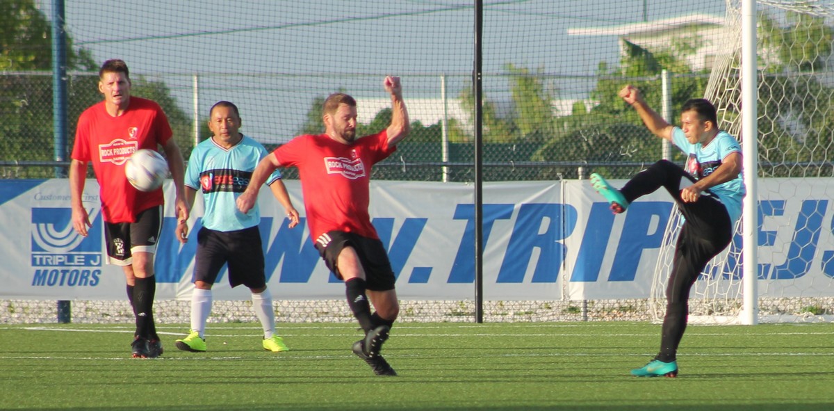 Eats Easy x The Game’s Fradel Sedillo takes the long shot  during a game of the Men’s M-League Masters Division at the NMI Soccer Training Center. Photo by James F. Sablan Jr. 