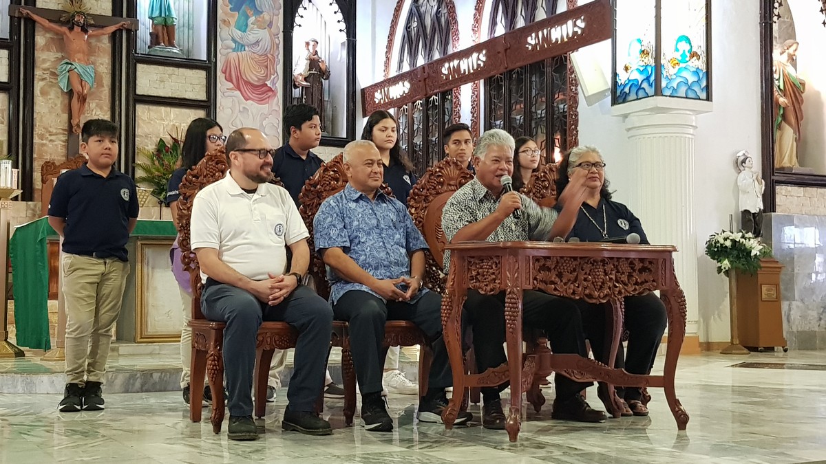 Lt. Gov. Arnold I. Palacios speaks before signing the proclamation designating Jan. 26 -Feb. 2, 2020 as Catholic Schools Week. Also in photo are Mount Carmel School students, MCS president Dr. Galvin Deleon Guerrero, MCS chairman of the board Ben Babauta, and MCS vice principal Barbara Merfalen.