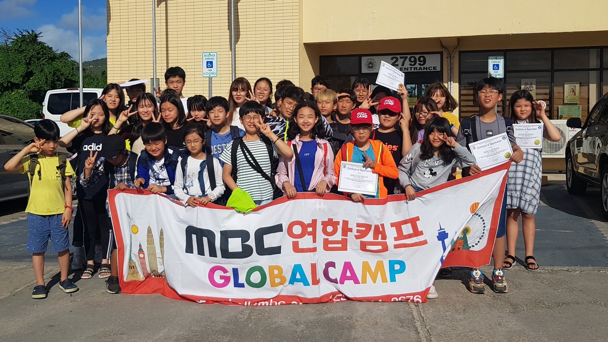 Visiting Korean students pose for a photo outside the Saipan mayor’s office. Photo by Junhan B. Todiño