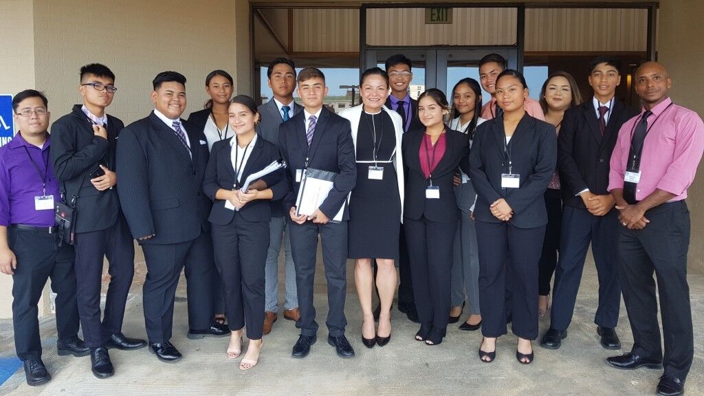 The Tinian High School Mock Trial team with their coaches: attorneys Kimberlyn King-Hinds and Chester Hinds. Photos by Bryan Manabat