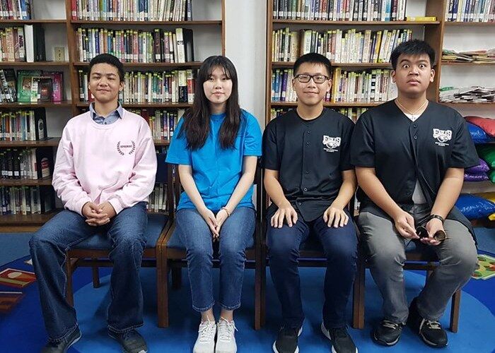 GCA January 2020 NSDA winners have their picture taken in the Rev. Raymond S. Kinsella Library.