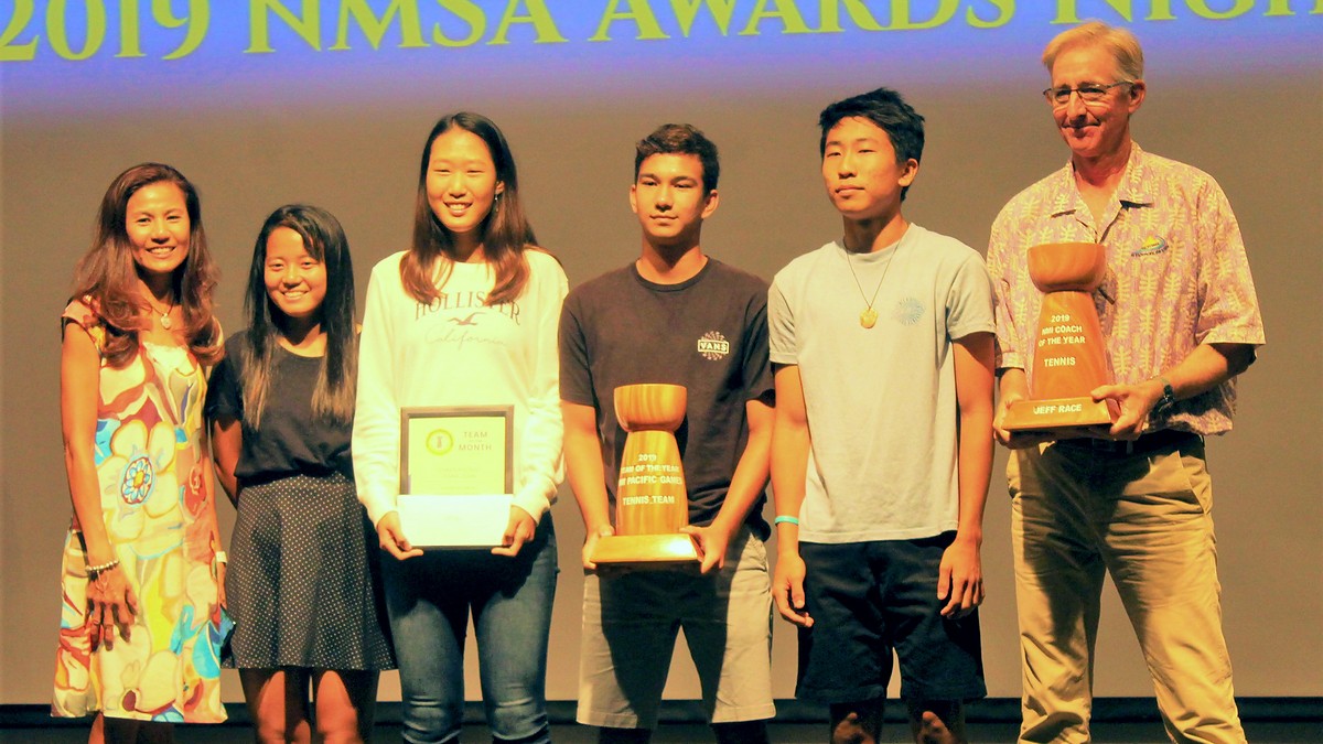 Members of the CNMI National Tennis Team — the 2019 Northern Marianas Sports Association Team of the Year — with Coach of the Year Jeff Race, far right, at the Fiesta Resort & Spa. Photo by James Sablan Jr.