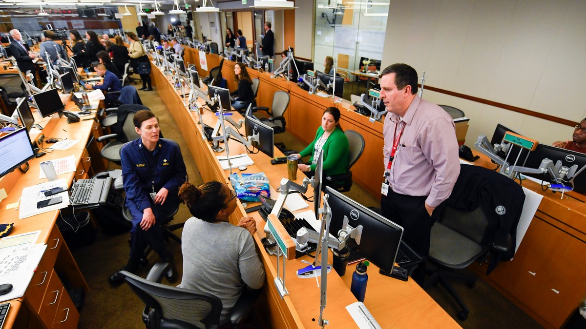 Personnel at the Centers for Disease Control and Prevention work the Emergency Operations Center in response to the 2019 novel coronavirus, among other things on Feb. 13, 2020 in Atlanta. AP