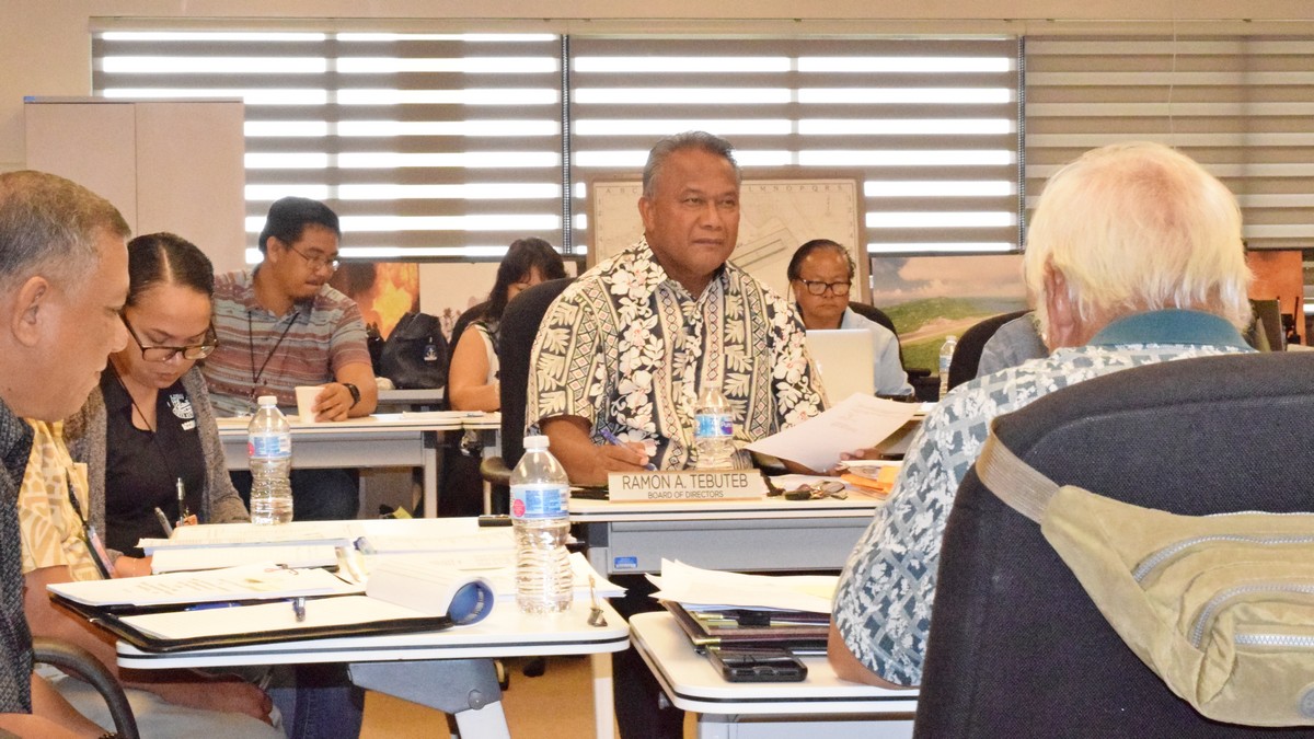 Commonwealth Ports Authority board member Ramon Tebuteb, center, with board member Pete Reyes, Deputy Director Ed Mendiola, comptroller Skye L. Hofschneider, and other CPA officials and personnel during a meeting on Thursday last week. Photo by Emmanuel T. Erediano