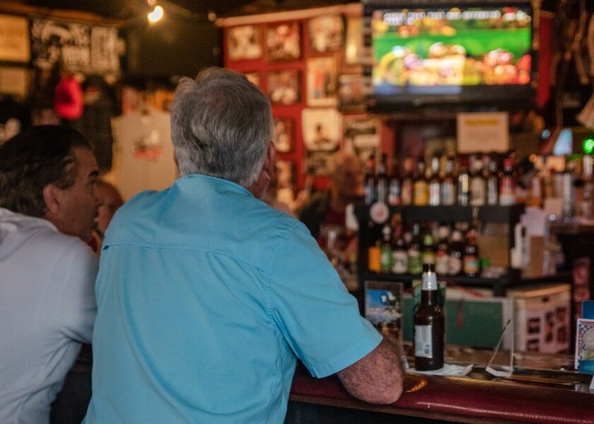 Patrons debate the wit and integrity of the referees in great detail at Godfather’s Bar on Super Bowl Monday. Fun fact: The average cost of a 30-second ad during the Super Bowl was $4.5 million — or just under the operating budget for the offices of the CNMI governor and lt. governor for all of fiscal year 2020. Photo by David Butterfield