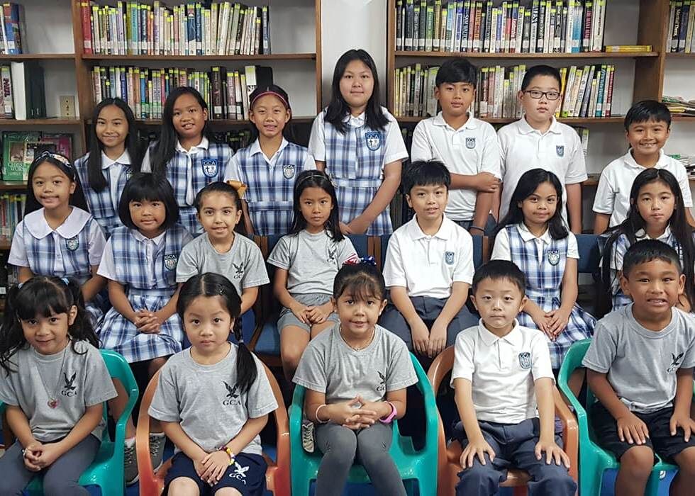 GCA January 2020 PGFC winners have their picture taken in the Rev. Raymond S. Kinsella Library.