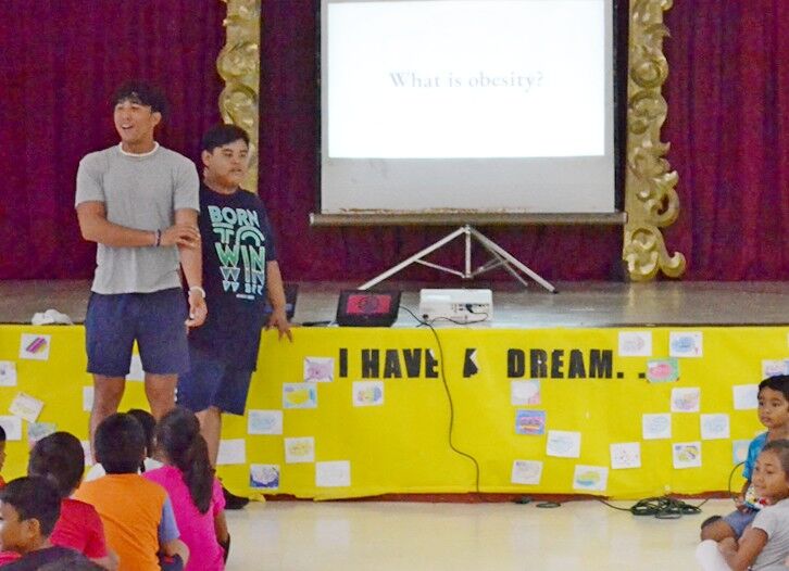 C/SFC Tyler Santos and C/SGT Ryan Nuera give a presentation on obesity.