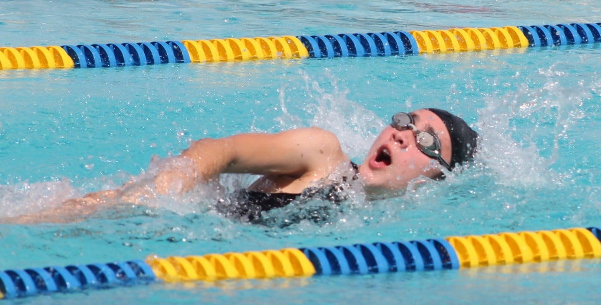Mount Carmel School’s Quina Flores takes a breather as she swims for the finish line during an event of the SSC All School Swim Meet, 200 LC Meter Freestyle Relay in 2017 at the Kan Pacific Swimming Pool.  Photo by James F. Sablan Jr.