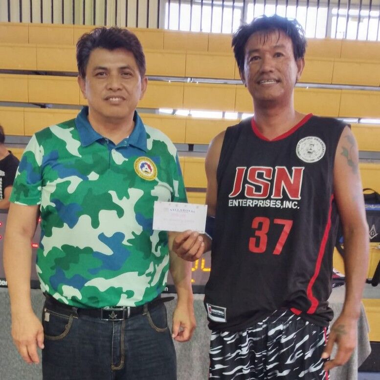 JSN’s Baroso poses with UFO’s Joselito Espino after being named the RNV Villaroyal Player of the Game. Contributed photo