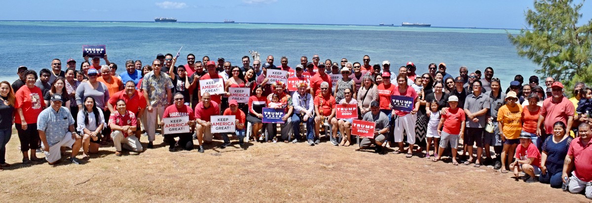 Gov. Ralph DLG Torres, Lt. Gov. Arnold I. Palacios and Trump campaign representative Dave Huguenel pose for a photo with members and officers of the NMI Republican Party during the presidential caucus on Sunday at the Minachom Atdao Pavilion. Photo by Emmanuel T. Erediano