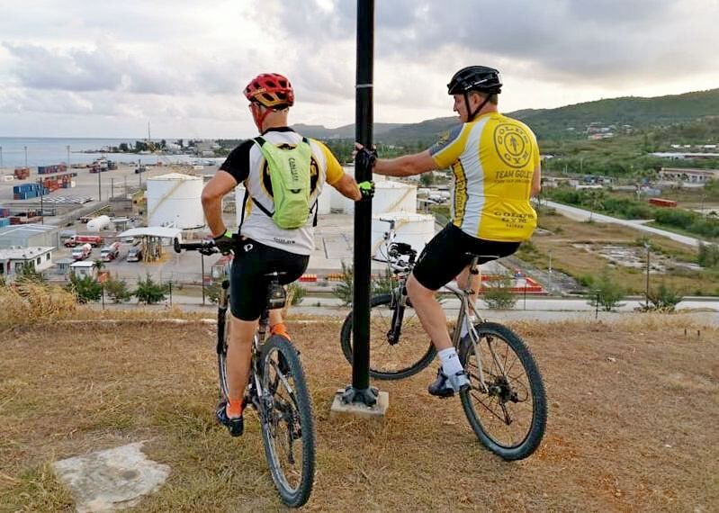 Bikers Rex Kosack and Sean Frink enjoy the view at Gov. Eloy S. Inos Peace Park on their way to Marpi.