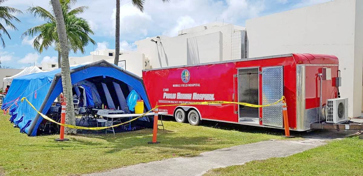 The Commonwealth Healthcare Corp. has set up a tent where medical personnel can screen people with respiratory symptoms. Photos by Lori Lyn C. Lirio
