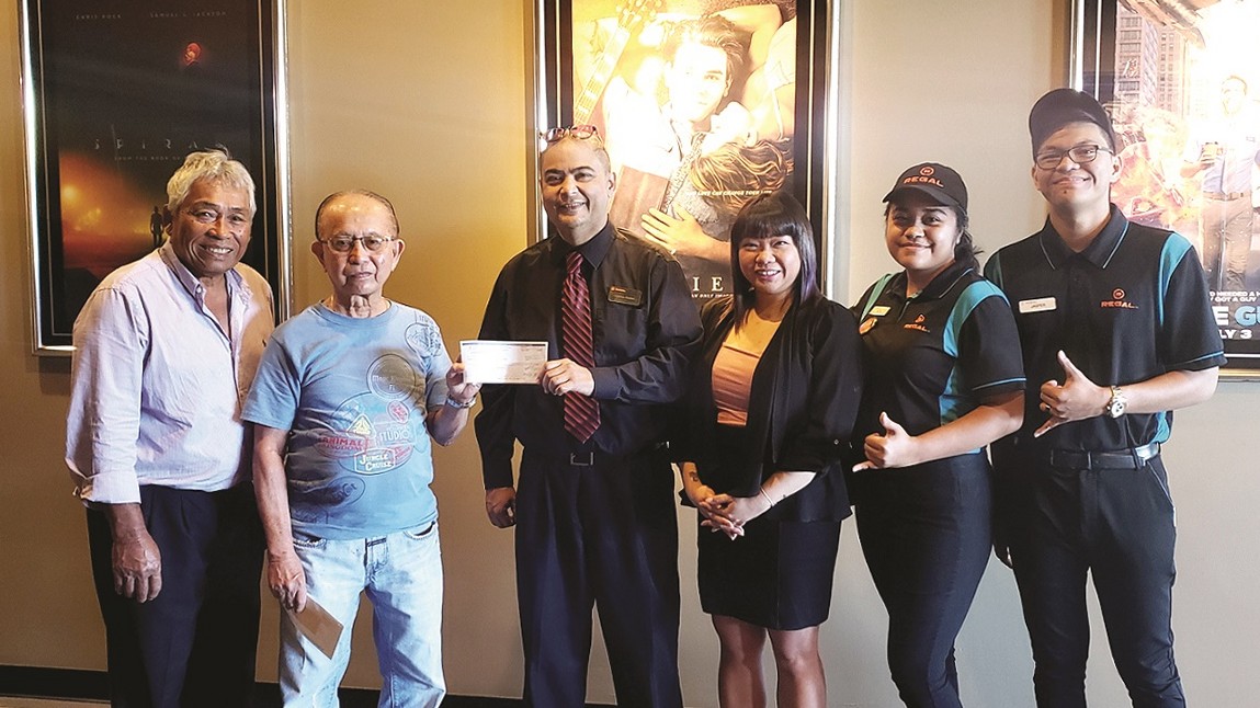 From left, Juan L. Babauta, Commonwealth Cancer Association executive director; Cesar Dumatol, CCA board treasurer; William I. Santos Jr., Regal Cinemas general manager; staff members Lisel Galvan, Ruth Ann Torres and Jasper Cain Duco. CCA photo