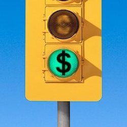 700-00024007 © Allan Davey Model Release: No Property Release: No Traffic Light with Dollar Symbol In Green Light