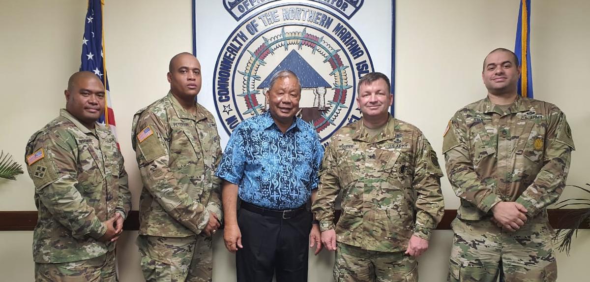 Saipan Mayor David M. Apatang poses with visiting U.S. Army Col. Ben Luper, U.S. Army Command Sgt. Major Charles J. Peterson II, Staff Sgt. Michael A. Ryan, and Staff Sgt. Romeo Igisomar. Contributed photo