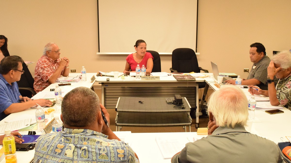 Commonwealth Ports Authority Chairwoman Kimberlyn King-Hinds, center background, speaks during a board meeting on Thursday. Photo by Emmanuel T. Erediano