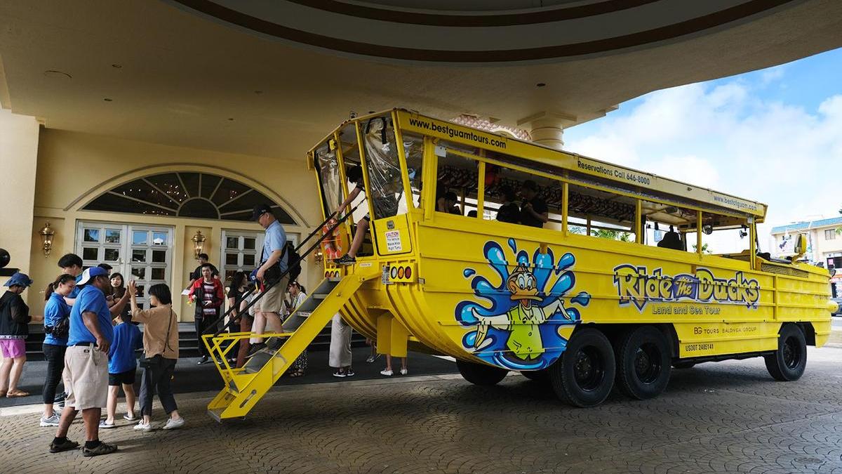 Passengers disembark from the Daffy Duck, an amphibious vehicle used for short ocean tours at the SandCastle Guam in Tumon on Friday afternoon. Photo by Norman M. Taruc/ The Guam Daily Post