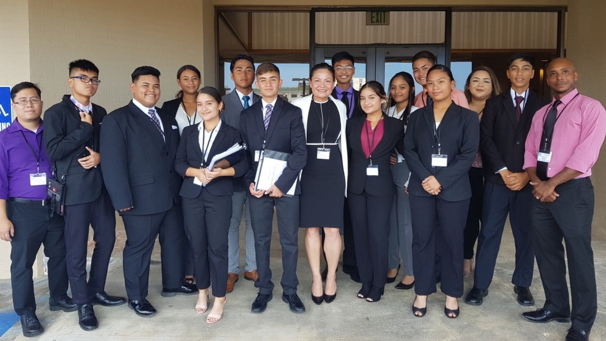 The Tinian High School Mock Trial team with their coaches: attorneys Kimberlyn King-Hinds and Chester Hinds. Photo by Bryan Manabat