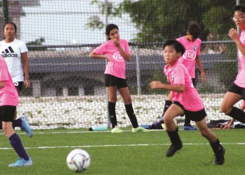 MP United’s Chan Woong Yeom chases after a loose ball during a game of the Youth League Spring 2020 U13 Coed Division at the NMI Soccer Training Center. Photo by James F. Sablan Jr.