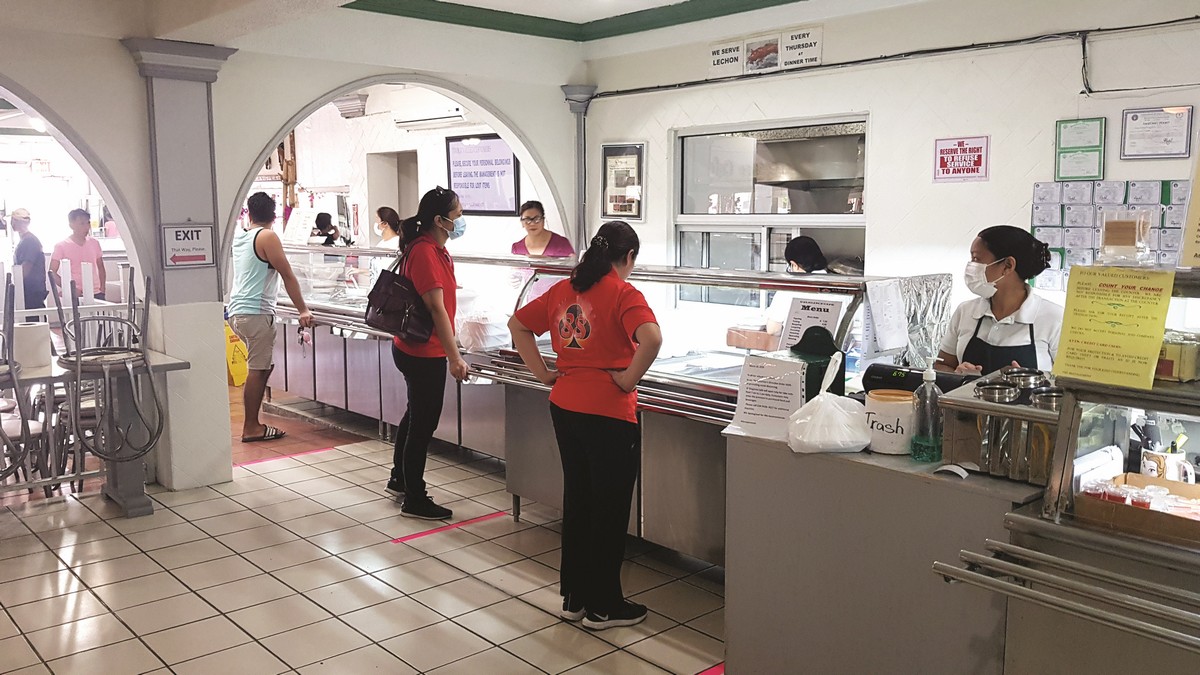 At D’Elegance Café in Garapan, markers on the floor designated the recommended distance between customers. The popular restaurant now closes at 1 p.m., in compliance with the governor’s directive, but its barbecues stall is open from 2 p.m. to 7 p.m. for takeout orders. Check out its Facebook page or call 234-9226/9227. Photos by Bryan Manabat