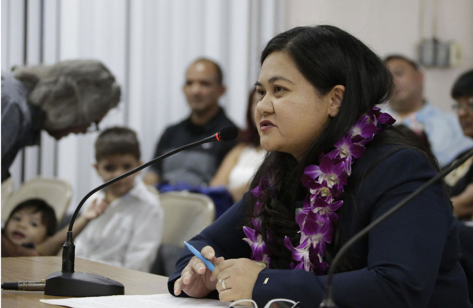 Passengers wear protective face masks at the departure hall of the high speed train station in Hong Kong on Jan. 23, 2020. AP