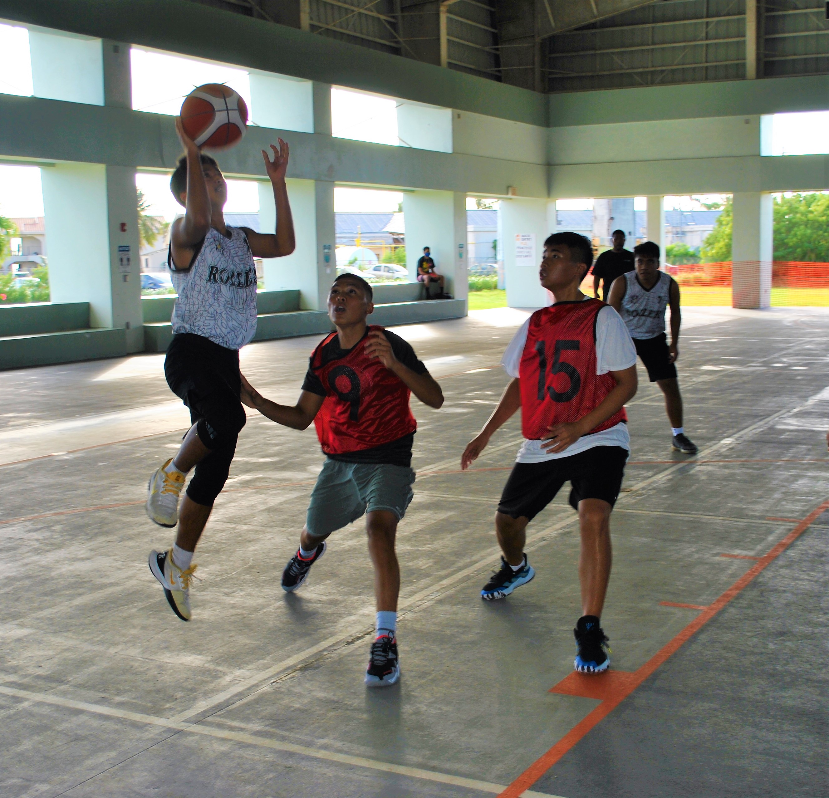 Rollers B's Darren Pangilinan pulls up for the floater during Monday's U17 championship game of the RBA Holiday Tournament at the Koblerville gym.Photo by James F. Sablan Jr