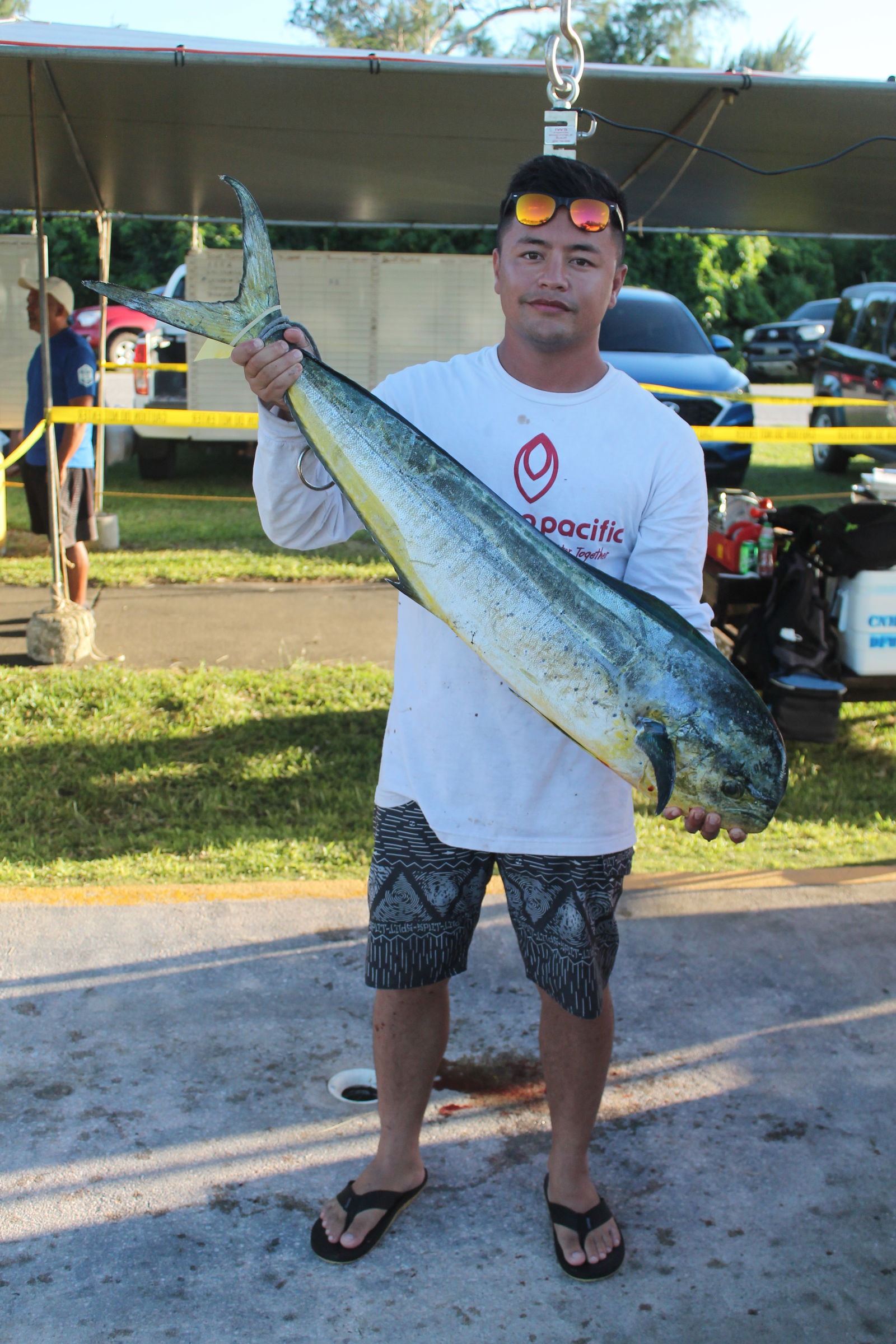 Boat Papasan poses with the winning catch weighing at 18.3lbs during last Saturday's 16th Annaul Mahi-Mahi Derby held at the Smiling Cove Marina.