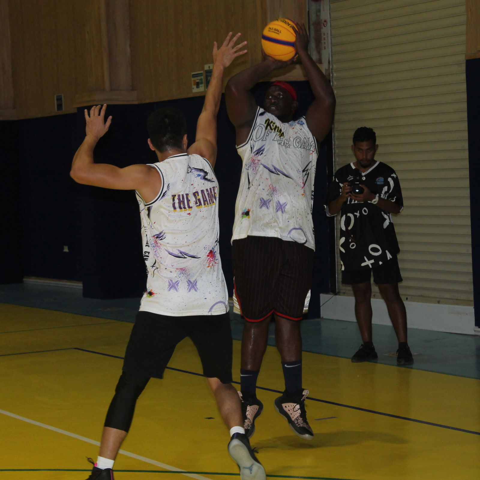 Richard McWilliams pulls up for the three-point shot over Stephen Erdene durinig last Saturday's Kings of the Game held at the ACS basketball court. 