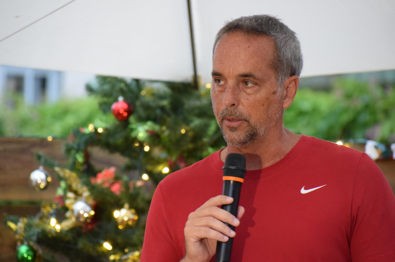 Pacific Rim president Keith Stewart delivers his remarks during the awarding of the “Christmas Surprise” for the Omelau family in Susupe on Wednesday. Photo by Emmanuel T. Erediano