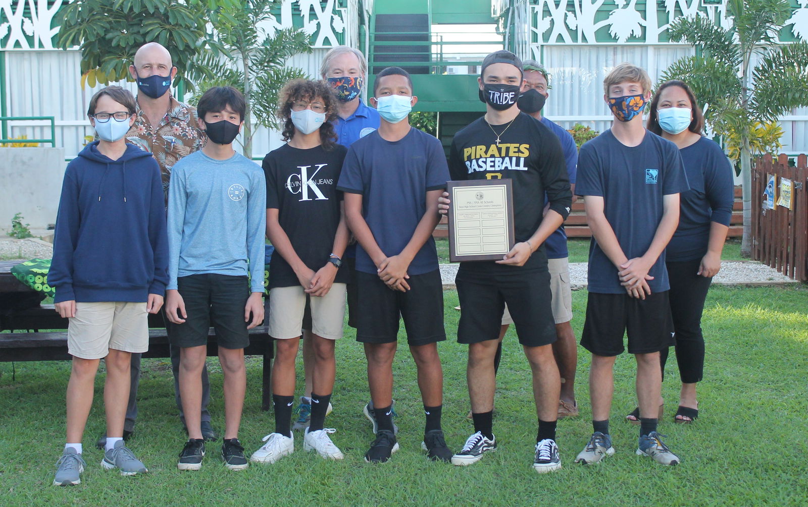 The boys of SIS  pose with the perpetual trophy of the High School division during last Friday's award ceremony of the 2020-2021 PSS/NMA All School Cross Country held at the Saipan Vegas