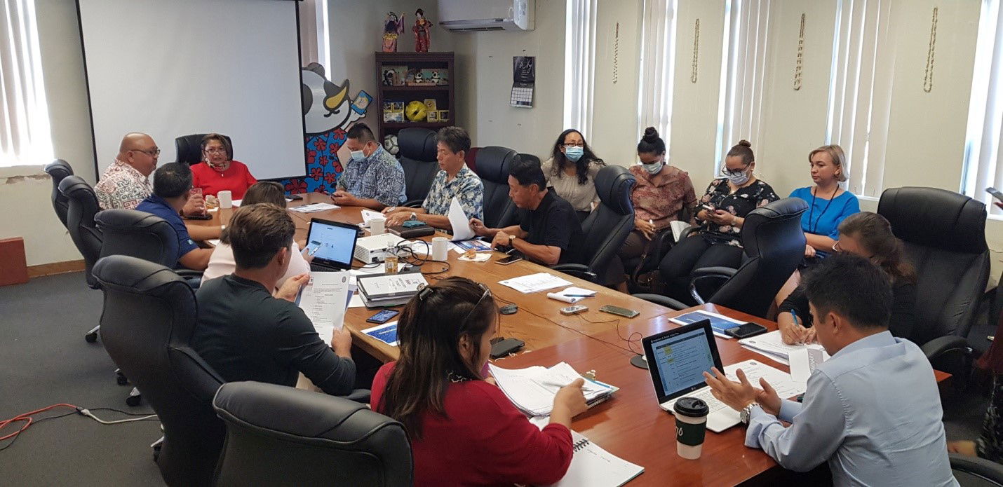 Gov. Ralph DLG Torres and E-Land chief executive officer Brian Shin attend the Marianas Visitors Authority board meeting on Wednesday.