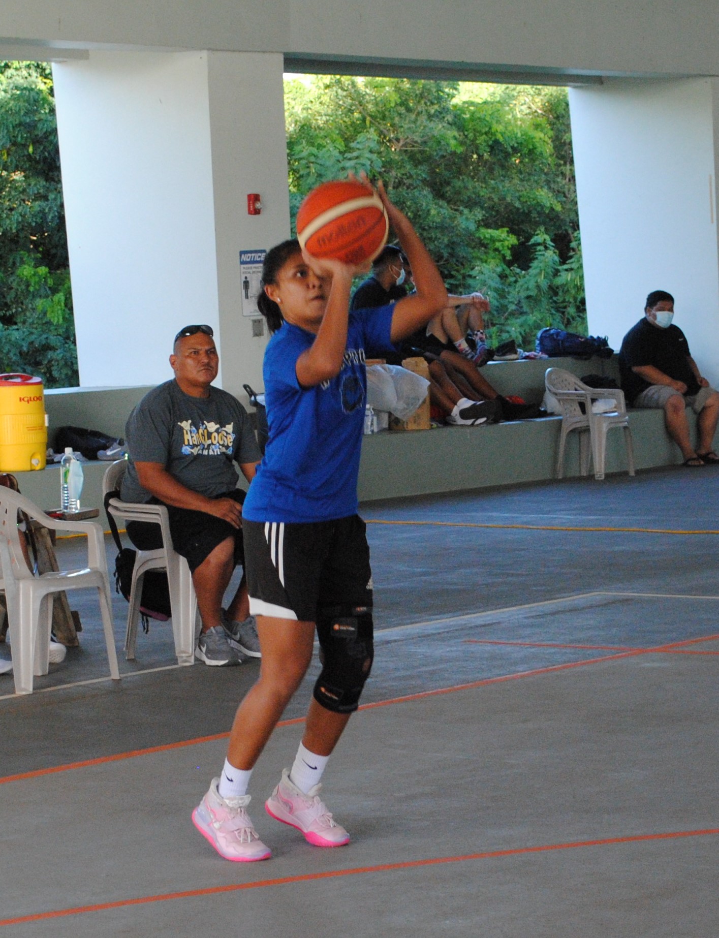 Rollers Blue's Chevy Alipio takes the three-point shot during an RBA Holiday Tournament-U19 division basketball game on Saturday at the Koblerville gym.Photo by James F. Sablan Jr.